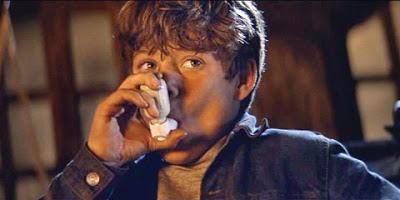 Film still from The Goonies (1985) / Warner Bros. mikey walsh the goonies asthma inhaler One-Eyed Willy goonies never say die