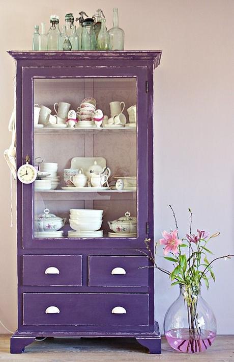 If your apartment doesn't have a pantry- this is a great way to store more dishes. Love the antique and bold color of this one!: 