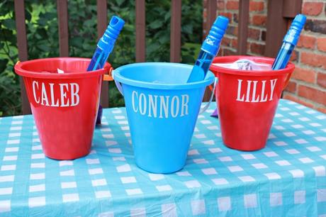Personalized Sand Bucket Party Favors at JustAGirlAndHerBlog.com
