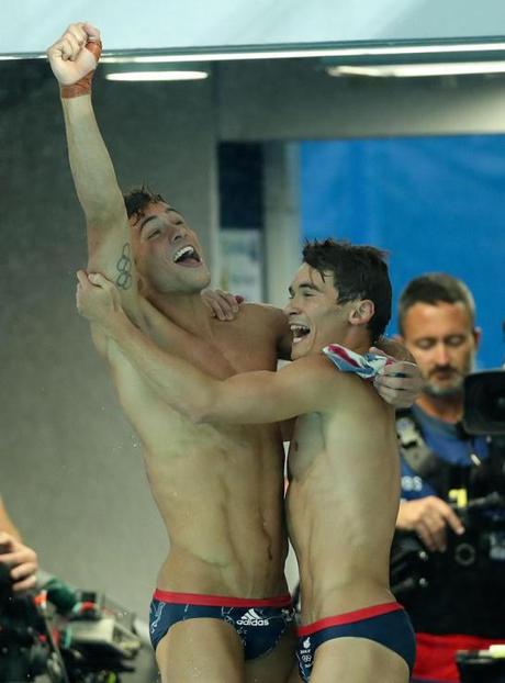 Rio De Janeiro, Brazil. 8th Aug, 2016. Thomas Daley (L) and Daniel Goodfellow of Great Britain celebrate after the men's synchronised 10m platform final of diving at the 2016 Rio Olympic Games in Rio de Janeiro, Brazil, on Aug. 8, 2016. Thomas Daley