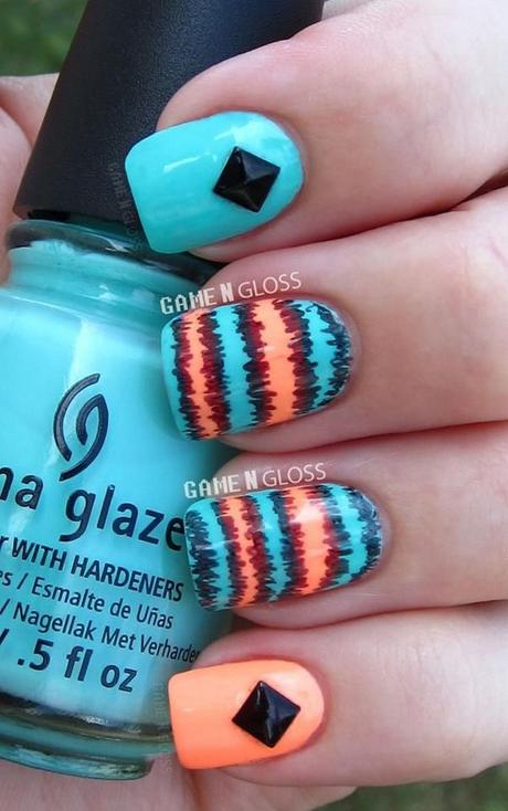 uñas azules con naranja