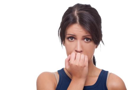 Head shot of worried woman over white background