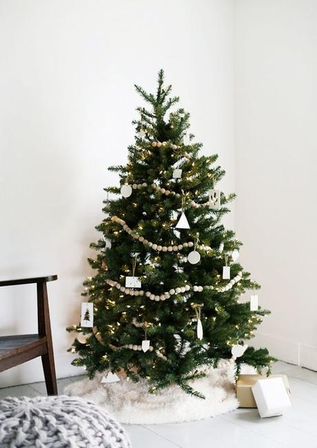 50 Christmas trees fully decorated from top to bottom featuring a variety of Christmas themes.: 