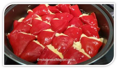 Pimientos del piquillo rellenos de merluza y langostinos