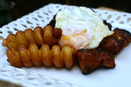 Costilla adobadas con patatas y huevos fritos 04