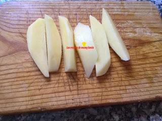 PATATAS EN GAJOS ADOBADAS AL HORNO