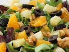 Ensalada rúcula, naranja queso vinagreta miel