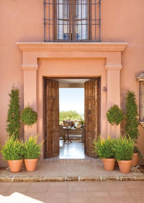 Fachada color terracota decorar una terraza atico