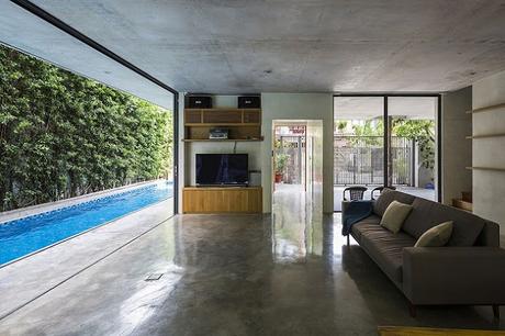 Residencia de Hormigon,  Vidrio y Vegetacion