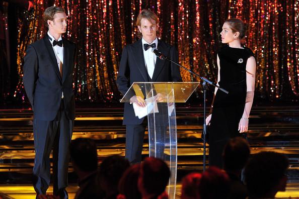 Andrea Casiraghi delivers a speech as Pierre Casiraghi (L) and Charlotte Casiraghi (R) look on during the Monaco Rose Ball 2011 at Sporting Monte Carlo on March 19, 2011 in Monte Carlo, Monaco. This year’s Rose Ball will not be attended by the Royal family as they are in mourning after Princess Antoinette of Monaco passed away on Friday at the age of 90.