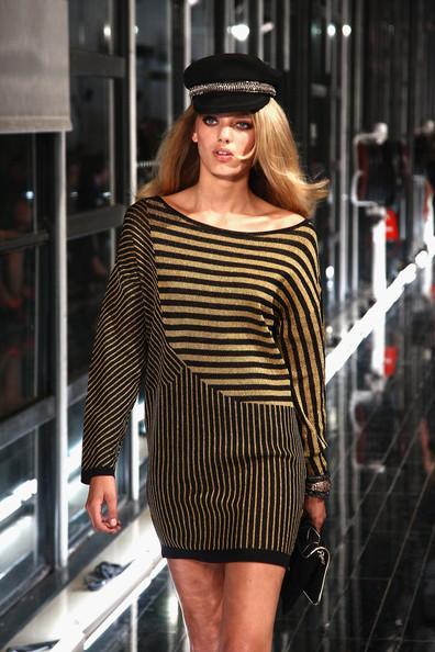 MANGO NEW COLLECTION WITH KATE MOSS A model walks the runway at the Mango new collection launch at Centre Pompidou on May 17, 2011 in Paris, France.