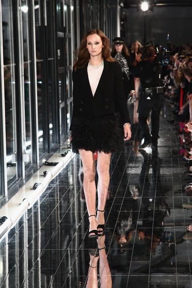 MANGO NEW COLLECTION WITH KATE MOSS A model walks the runway during the Mango new collection launch at Centre Pompidou on May 17, 2011 in Paris, France.