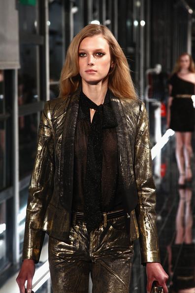 MANGO NEW COLLECTION WITH KATE MOSS A model walks the runway at the Mango new collection launch at Centre Pompidou on May 17, 2011 in Paris, France.