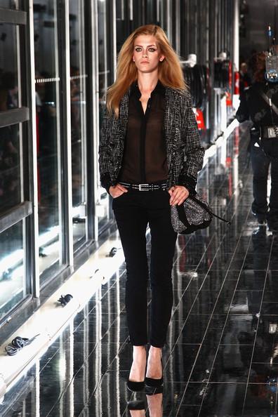 MANGO NEW COLLECTION WITH KATE MOSS A model walks the runway during the Mango new collection launch at Centre Pompidou on May 17, 2011 in Paris, France.