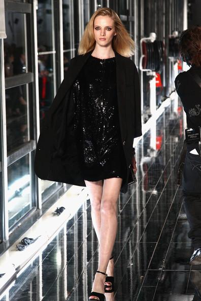 MANGO NEW COLLECTION WITH KATE MOSS A model walks the runway during the Mango new collection launch at Centre Pompidou on May 17, 2011 in Paris, France.