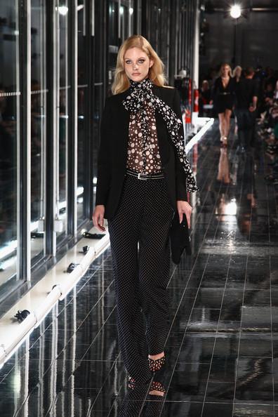 MANGO NEW COLLECTION WITH KATE MOSS A model walks the runway during the Mango new collection launch at Centre Pompidou on May 17, 2011 in Paris, France.