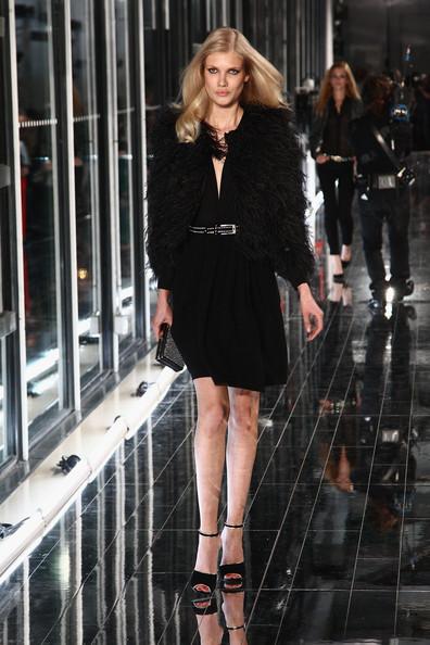 MANGO NEW COLLECTION WITH KATE MOSS A model walks the runway during the Mango new collection launch at Centre Pompidou on May 17, 2011 in Paris, France.