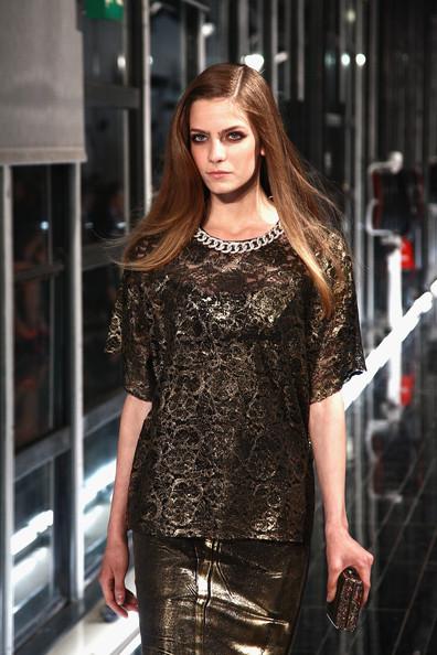 MANGO NEW COLLECTION WITH KATE MOSS A model walks the runway at the Mango new collection launch at Centre Pompidou on May 17, 2011 in Paris, France.