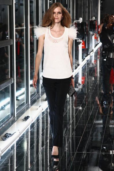 MANGO NEW COLLECTION WITH KATE MOSS A model walks the runway during the Mango new collection launch at Centre Pompidou on May 17, 2011 in Paris, France.