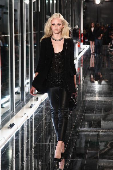 MANGO NEW COLLECTION WITH KATE MOSS A model walks the runway during the Mango new collection launch at Centre Pompidou on May 17, 2011 in Paris, France.