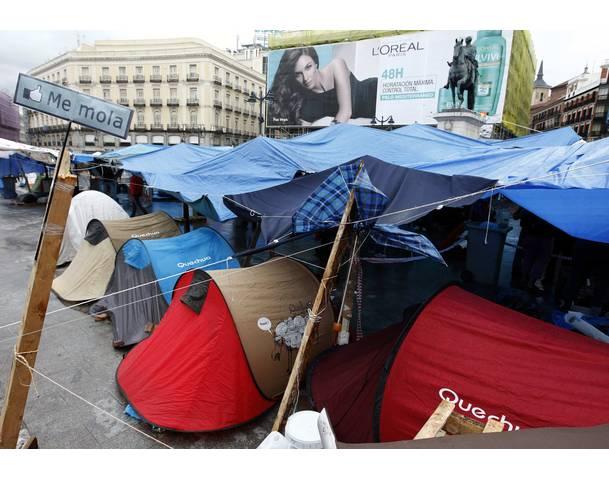 DEMOCRACIA REAL, YA! Demonstrators camp out at Madrid's famous landmark Puerta del Sol