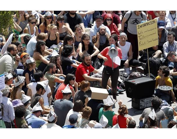 DEMOCRACIA REAL, YA! Demonstrators listen to a speaker in Madrid's Puerta del Sol