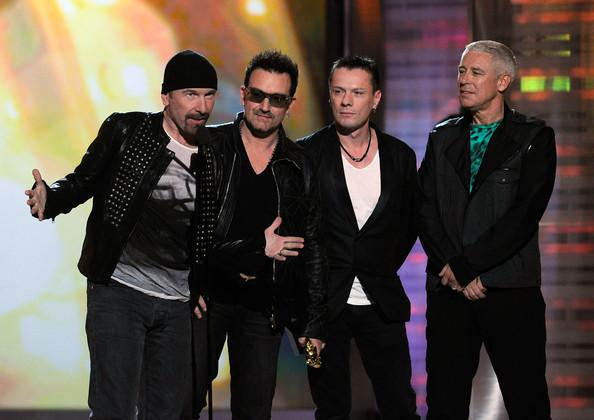 Musicians The Edge, Bono, Larry Mullen Jr. and Adam Clayton of the band U2 accept the Touring Top Artist Award onstage during the 2011 Billboard Music Awards at the MGM Grand Garden Arena May 22, 2011 in Las Vegas, Nevada.