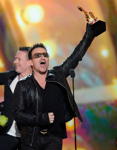 Singer Bono of U2 accepts the Top Touring Artist award onstage during the 2011 Billboard Music Awards at the MGM Grand Garden Arena May 22, 2011 in Las Vegas, Nevada.