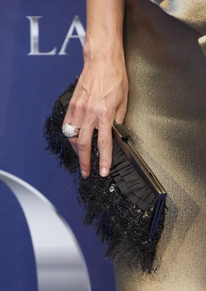 PREMIOS 'YO DONA' 2011 Spanish model Paloma Lago (purse and jewelry detail) attends