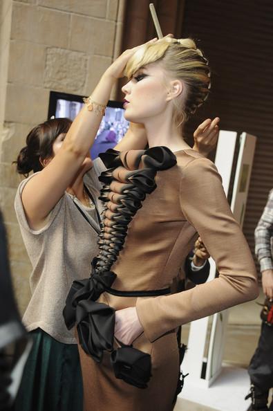 STEPHANE ROLLAND BACKSTAGE & GUESTS A model prepares backstage during the Stephane Rolland Haute Couture Fall/Winter 2011/2012 show as part of Paris Fashion Week at Cite de l'Architecture et du Patrimoine on July 5, 2011 in Paris, France.