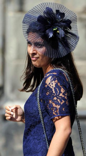 A guest arrives for the Royal wedding of Zara Phillips and Mike Tindall at Canongate Kirk on July 30, 2011 in Edinburgh, Scotland. The Queen's granddaughter Zara Phillips will marry England rugby player Mike Tindall today at Canongate Kirk. Many royals are expected to attend including the Duke and Duchess of Cambridge.