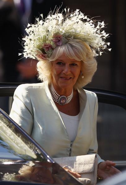 Camilla, Duchess of Cornwall arrives for the Royal wedding of Zara Phillips and Mike Tindall at Canongate Kirk on July 30, 2011 in Edinburgh, Scotland. The Queen's granddaughter Zara Phillips will marry England rugby player Mike Tindall today at Canongate Kirk. Many royals are expected to attend including the Duke and Duchess of Cambridge.