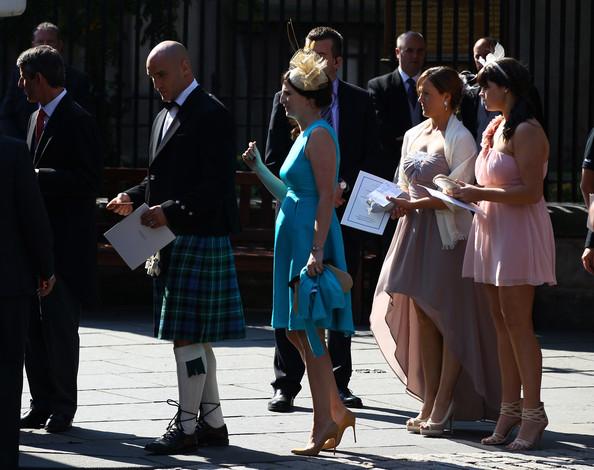 Guests depart from the Royal wedding of Zara Phillips and Mike Tindall at Canongate Kirk on July 30, 2011 in Edinburgh, Scotland. The Queen's granddaughter Zara Phillips will marry England rugby player Mike Tindall today at Canongate Kirk. Many royals are expected to attend including the Duke and Duchess of Cambridge.