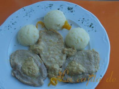 Lomo de cerdo con crema de naranja