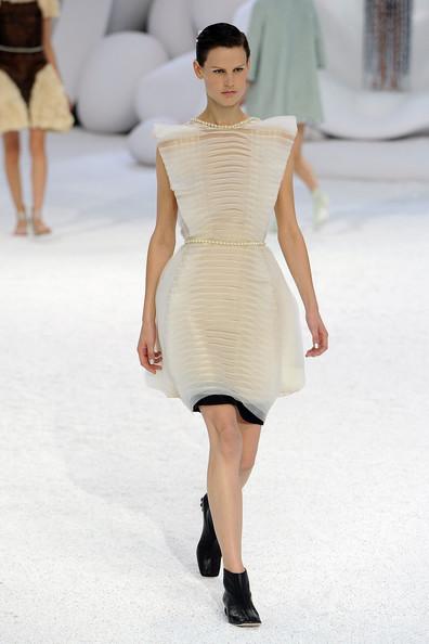 A model walks the runway during the Chanel Ready to Wear Spring / Summer 2012 show during Paris Fashion Week at Grand Palais on October 4, 2011 in Paris, France.