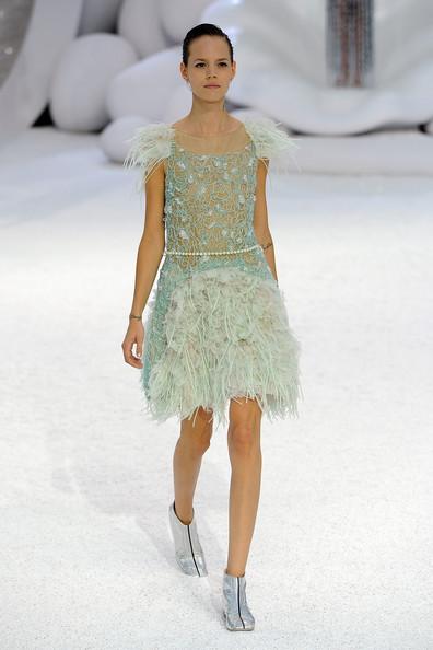 A model walks the runway during the Chanel Ready to Wear Spring / Summer 2012 show during Paris Fashion Week at Grand Palais on October 4, 2011 in Paris, France.