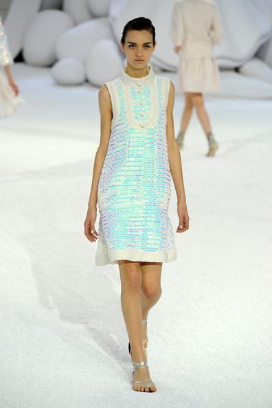 A model walks the runway during the Chanel Ready to Wear Spring / Summer 2012 show during Paris Fashion Week at Grand Palais on October 4, 2011 in Paris, France.