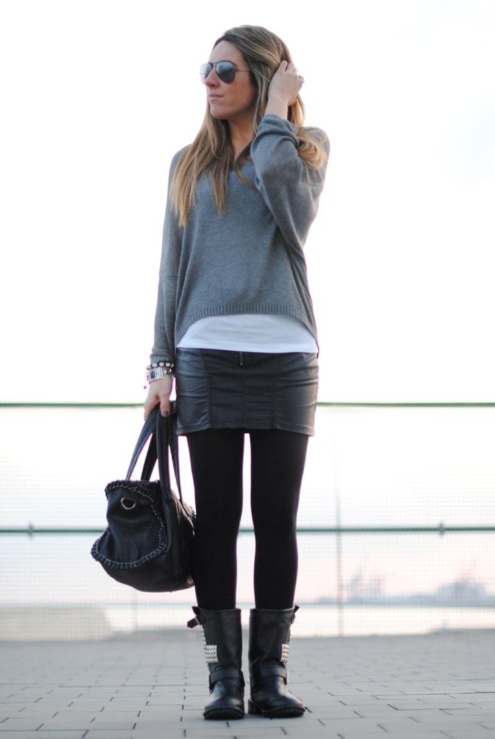 Studded boots in front of the sea Studded boots in front of the sea