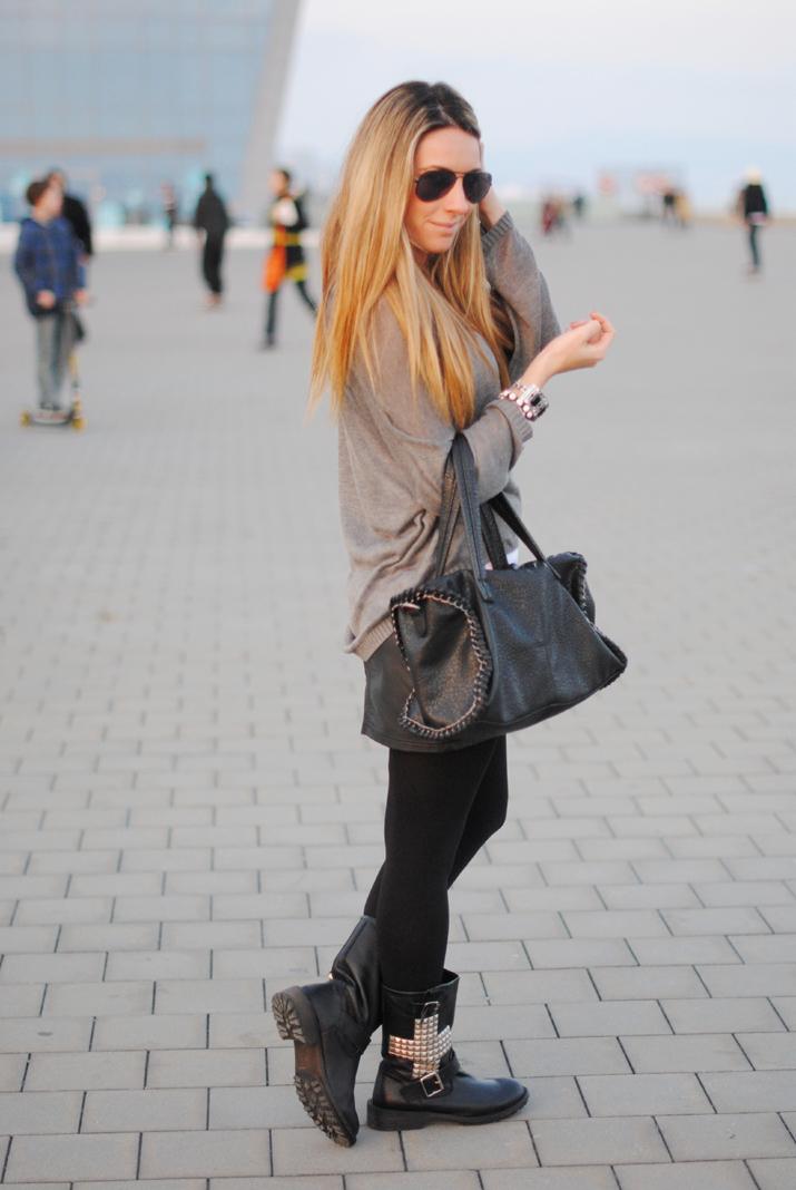 Studded boots in front of the sea Studded boots in front of the sea