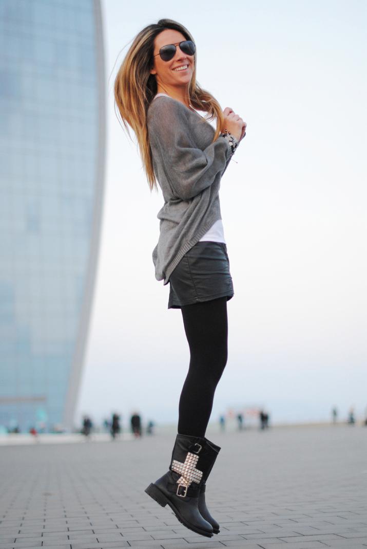 Studded boots in front of the sea Studded boots in front of the sea