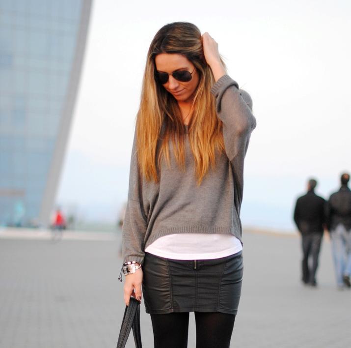 Studded boots in front of the sea Studded boots in front of the sea