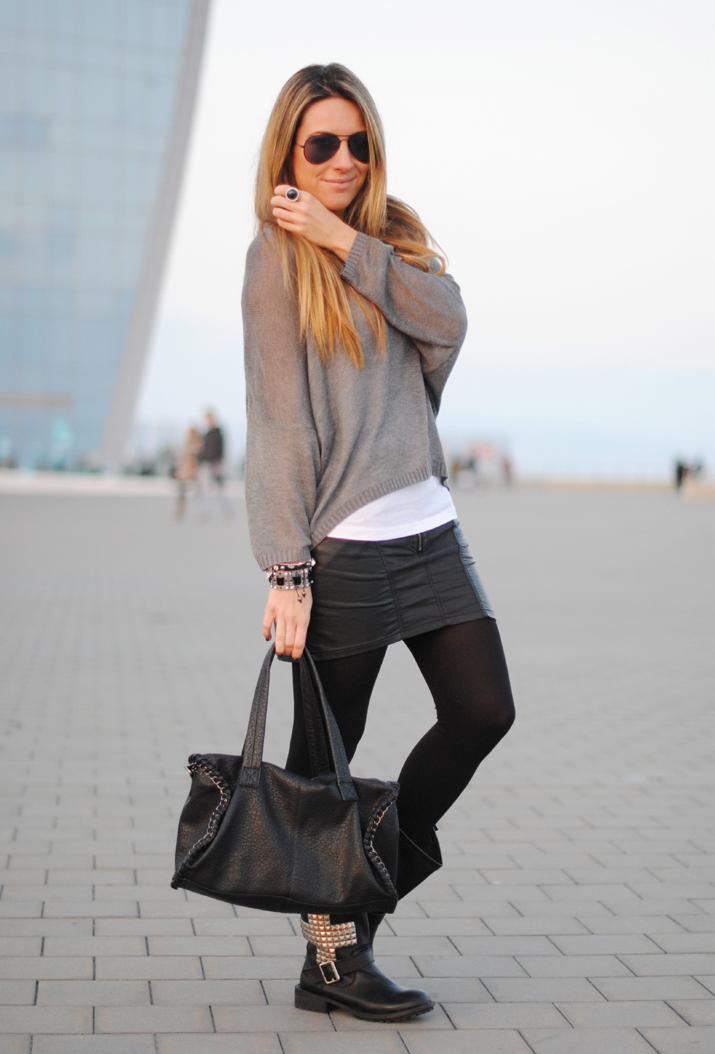 Studded boots in front of the sea Studded boots in front of the sea