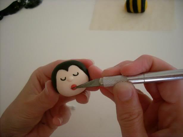 Modelado en fondant: Abeja Anne Geddes http://i65.photobucket.com/albums/h229/astrawes/12Gezichtje8.jpg