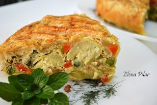 Hojaldre relleno Tortilla Patatas, Verduras Président Queso Cocina Semicurado. 