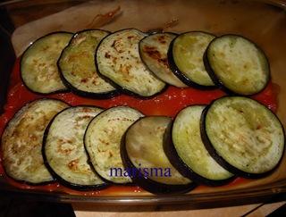 berengenas con tomate en fuente