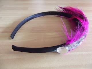 Diadema de Plumas de Conjuntadisima Diadema de Plumas de Conjuntadisima