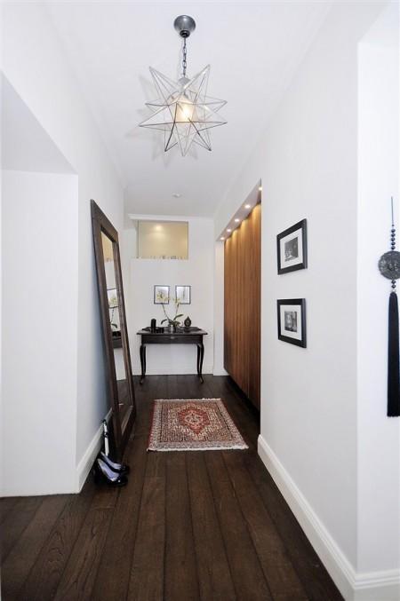 ventanas paneladas suelo de parquet de roble teñido suelo de madera de roble teñido salón planta redonda piso con chimenea Estilo nórdico sobre suelo de madera de roble diseño de interiores decoración piso diáfano decoración nórdica decoración escandinava decoración en blanco y madera decoración de interiores cocina en dos acabados cocina blanca cocina americana cocina abierta al salón cocina abierta azulejos modernos baño y cocina 