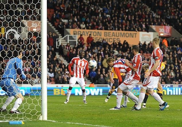 Heads up: Crouch nods home.. but into his own net to give Everton the lead