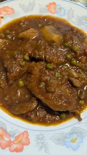 Lomo en salsa con verduras