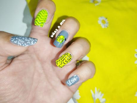 Diseño de uñas en amarillo y gris
